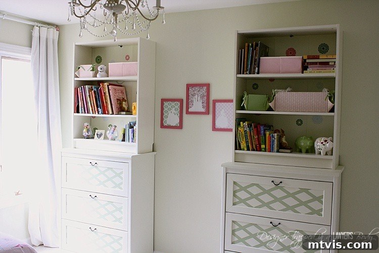 Close-up of custom DIY upholstered headboard with decorative pillows