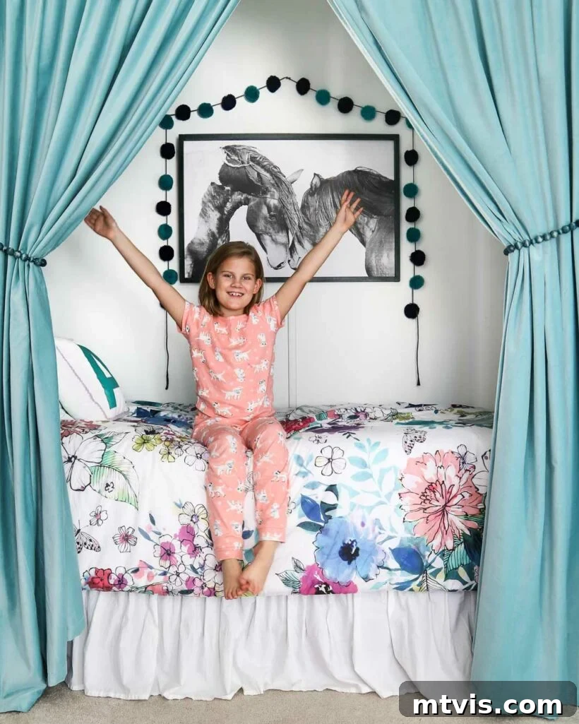 28 Whimsical Wonderland Bedrooms for Her 6 happy young girl in colorful bedroom