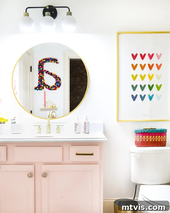 Supersize Your Walls With DIY Letters 13 Colorful girl's bathroom with the large 'A' wall letter reflected in a vanity mirror