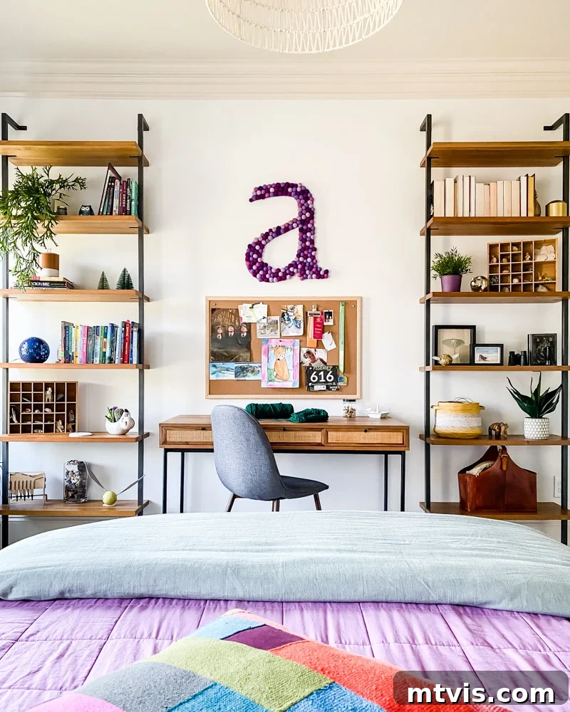 Supersize Your Walls With DIY Letters 16 Girl's bedroom featuring a desk, bookshelves, and a large custom wall letter hanging on the wall