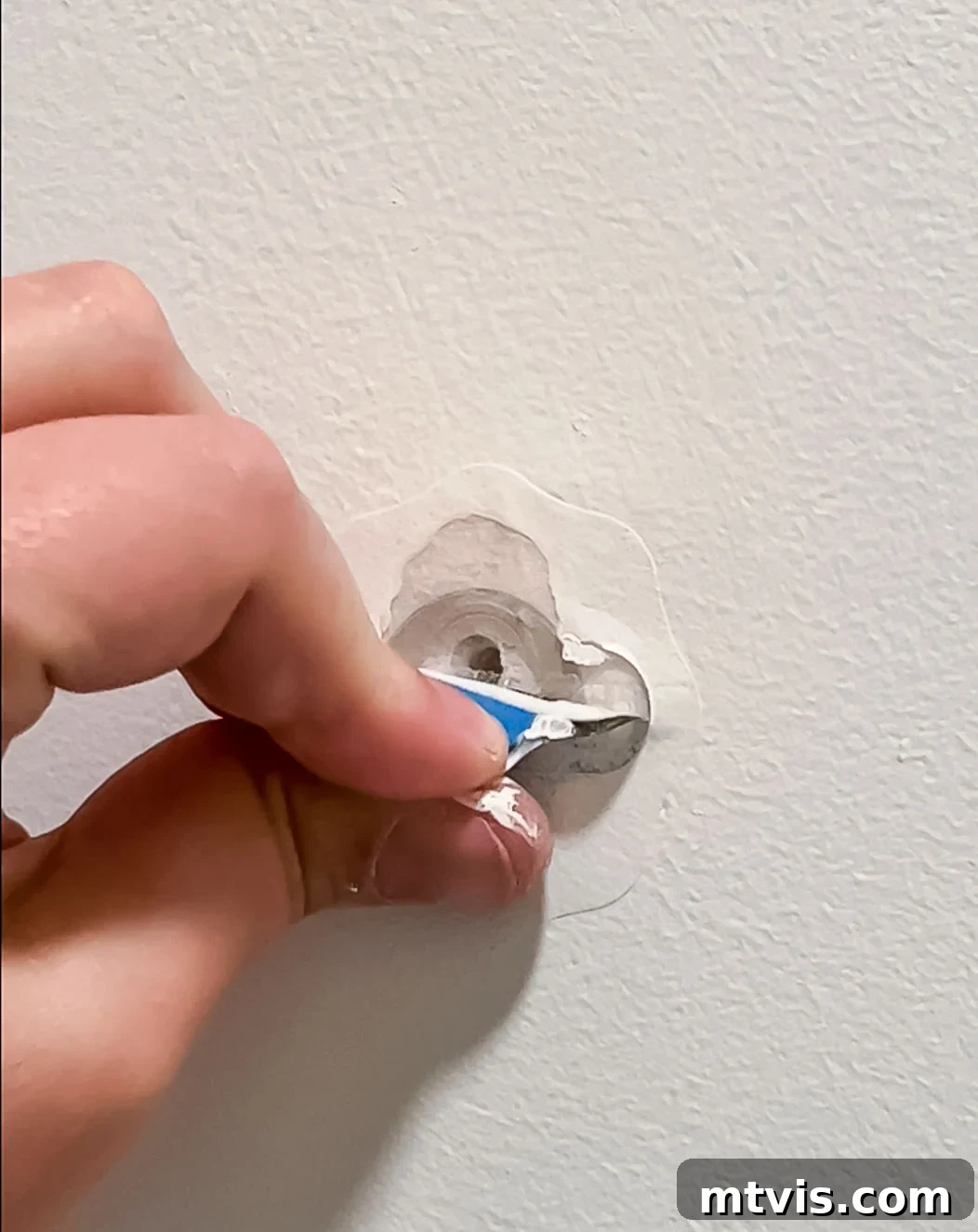 removing pop up tab from DAP Eclipse wall repair patch