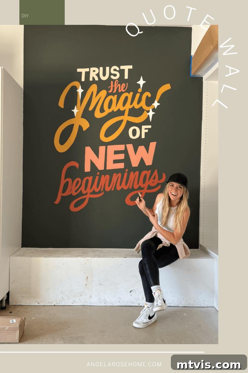 23 Ingenious DIY Wall Art Projects 7 A large, hand-painted wall quote in a garage reads 'Trust the Magic of New Beginnings,' with a woman sitting thoughtfully in front of it.