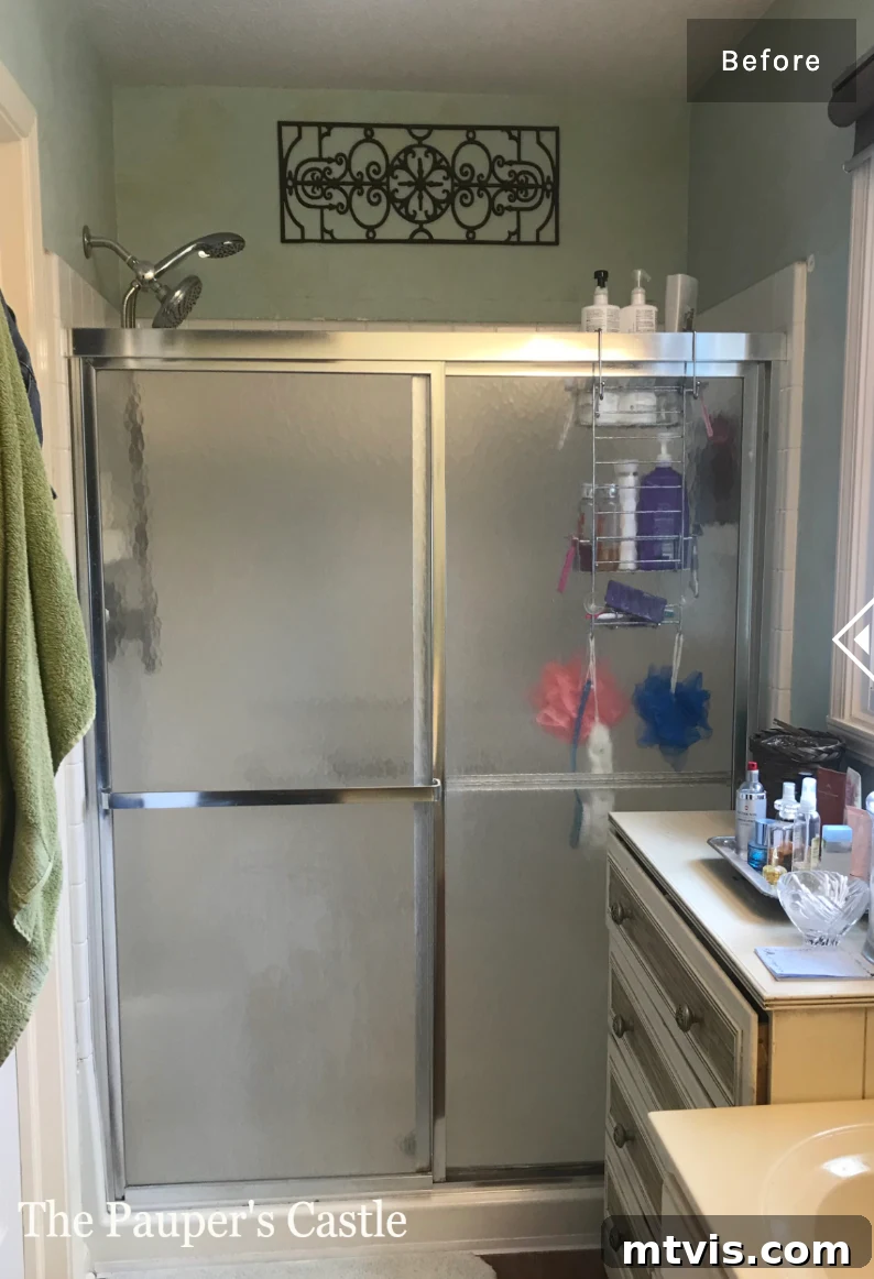 15+ Ingenious DIY Bathroom Renovation Ideas That Won't Break the Bank 22 oudated sliding shower doors with an old-fashioned appearance