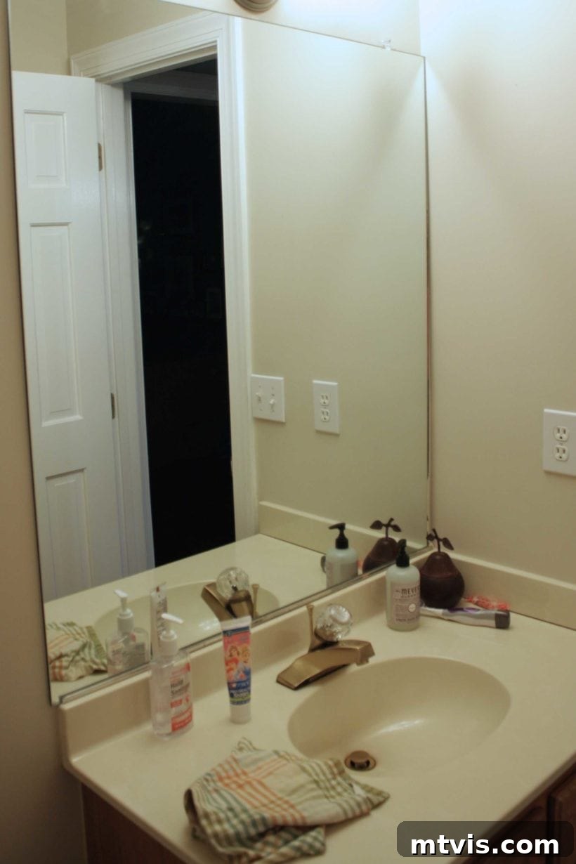 15+ Ingenious DIY Bathroom Renovation Ideas That Won't Break the Bank 7 outdated cultured marble vanity before concrete overlay