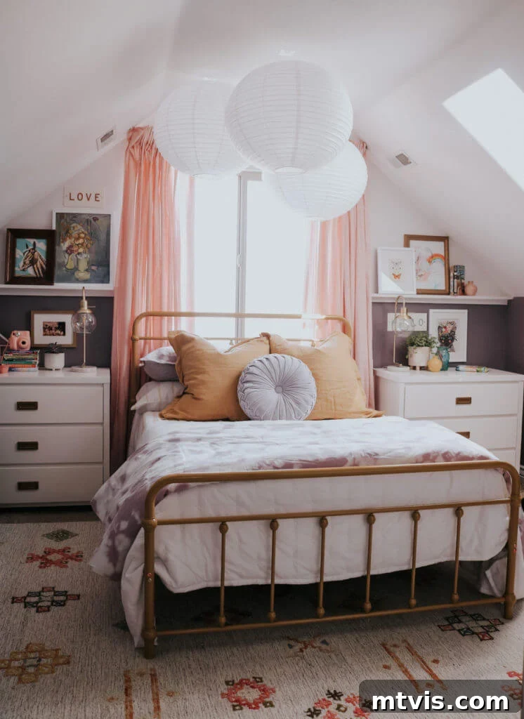 25 Creative Bedroom Transformations for Teenagers 16 One teen bedroom idea shows a neutral attic bedroom with round paper lanterns hanging from ceiling over the bed with muted bedding.