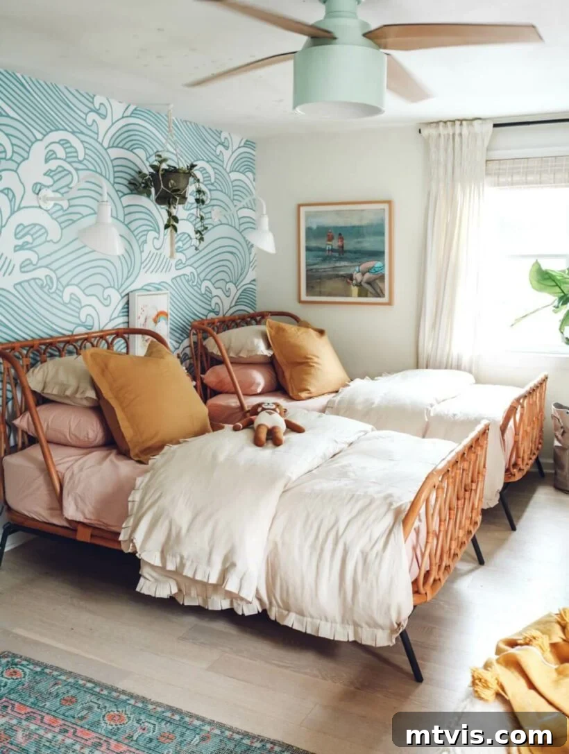 Brilliant Shared Kids' Bedroom Hacks 6 boho wood beds with blue wave wallpaper and neutral bedding