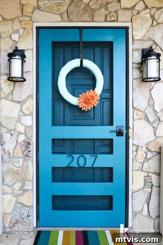 Craft Your Perfect Screen Door 13 DIY screen door repainted in a stylish teal blue color (Velvet Curtains by Valspar)
