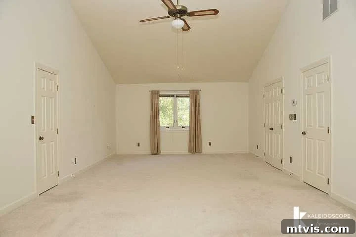 outdated, beige primary bedroom