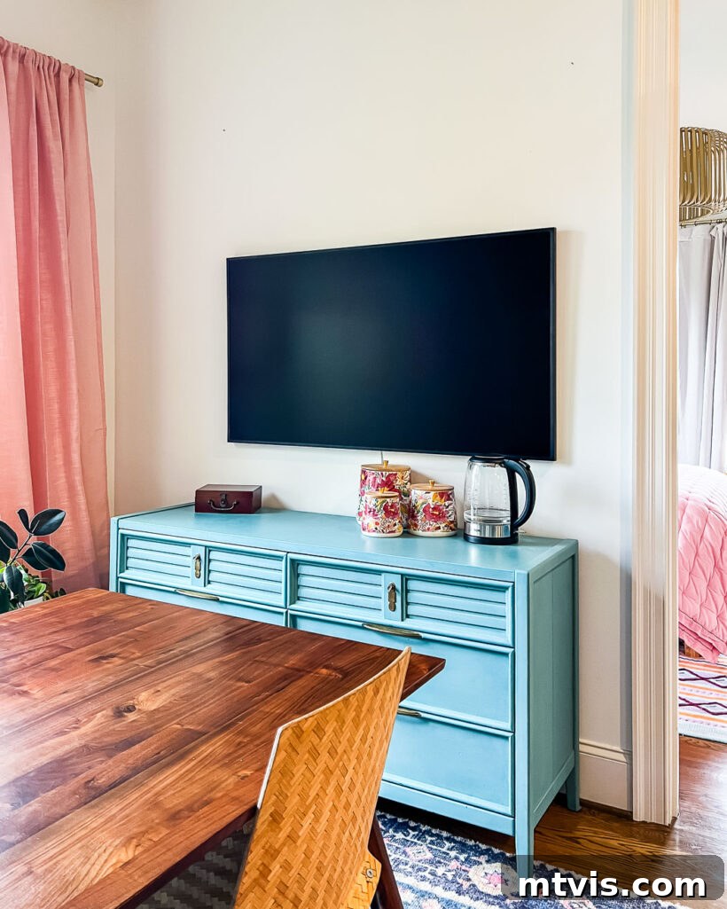 Build a Custom Frame for Your Television 3 Tv mounted on wall without any frame or art, showing a stark black rectangle