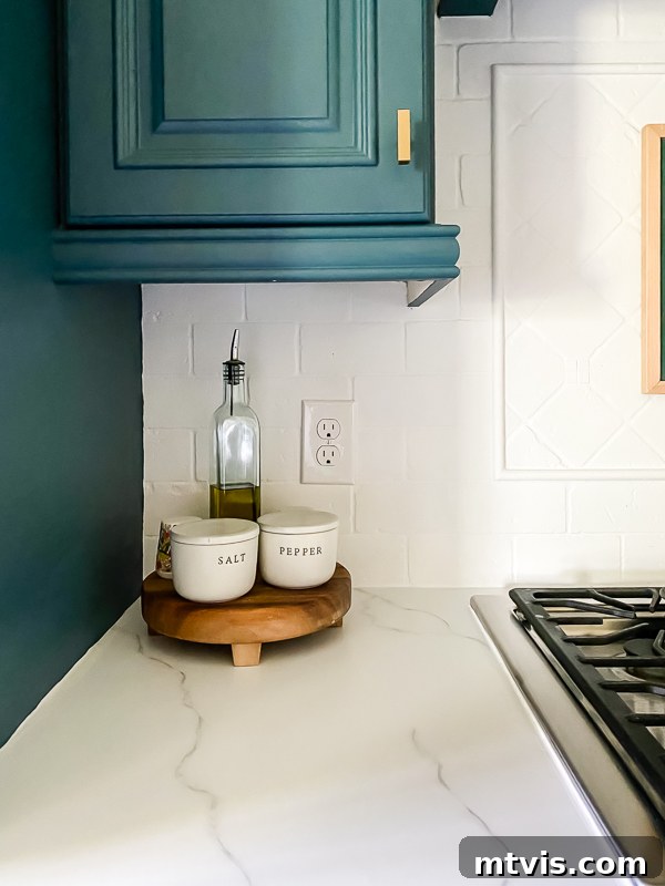Kitchen Renovation Revealed: Our Decisions and the Dazzling New Layout 5 Small section of painted countertops beside cooktop, illustrating limited prep space