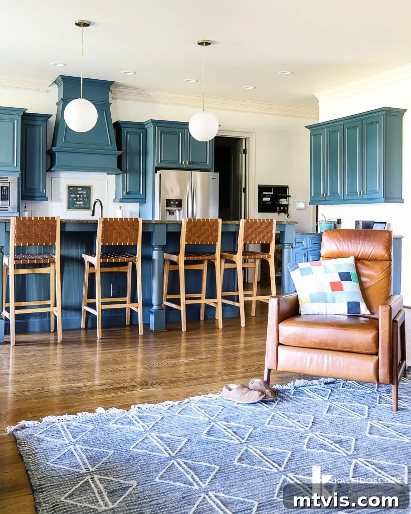 Kitchen Renovation Revealed: Our Decisions and the Dazzling New Layout 7 Great room with blue kitchen cabinets, showing the underutilized space on the right