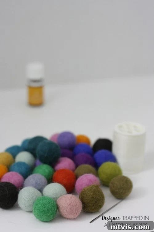 Homemade Pure Car Fragrance 3 A group of many-colored felted balls on a white background with white thread and a needle. The text in the bottom right corner reads,