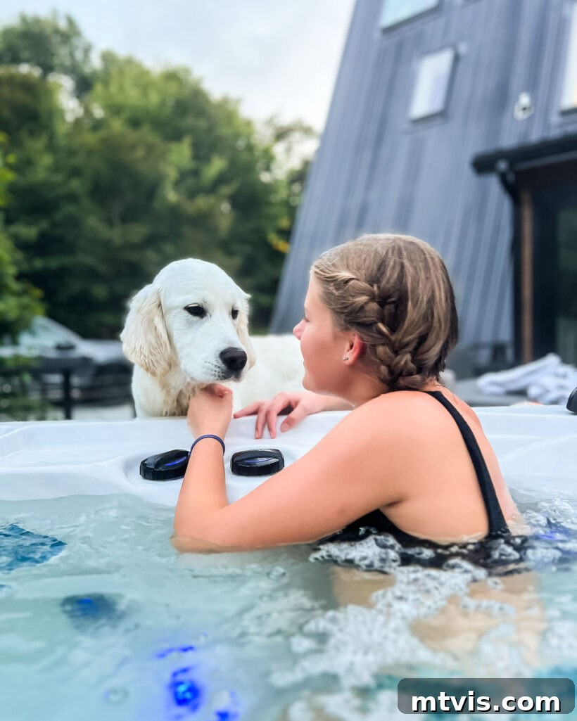 Our Dogs' Transformation on Ollie's Fresh Food 6 Teenage girl relaxing in a hot tub with an English Cream Golden Retriever affectionately looking on