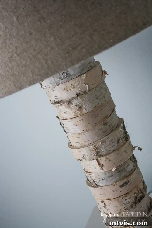 DIY Stacked Wood Lamp: Designer Style on a Budget 19 Elegant close-up of the stacked wood lamp detail and lampshade