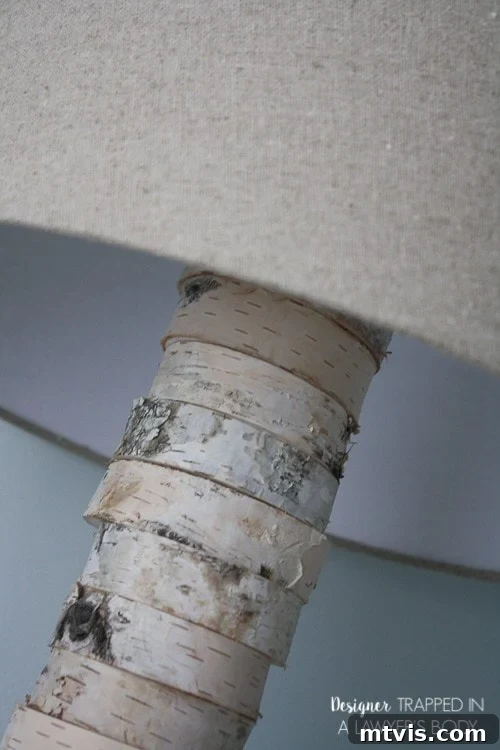 DIY Stacked Wood Lamp: Designer Style on a Budget 20 The stacked wood lamp in a beautifully styled home setting