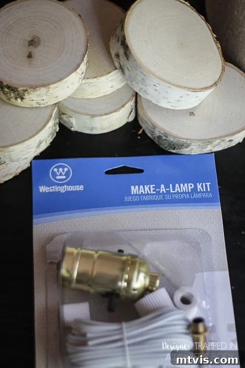 DIY Stacked Wood Lamp: Designer Style on a Budget 5 Close-up of birch wood slices, lamp parts, and tools on a workbench