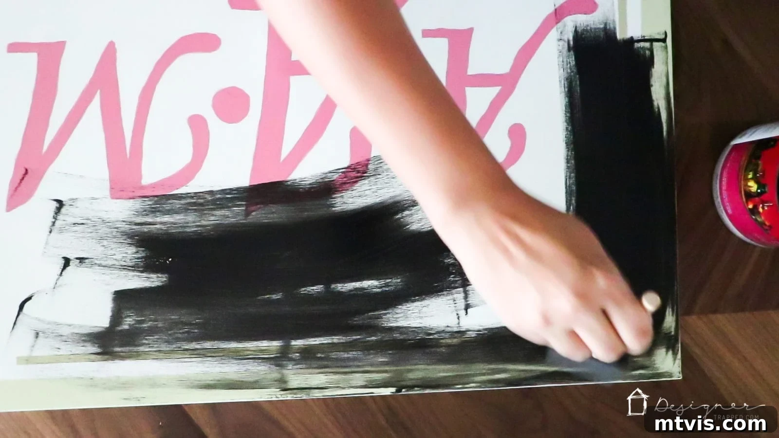 DIY Textured Photo Canvas Art 4 Painting the sides of a canvas with black acrylic paint.