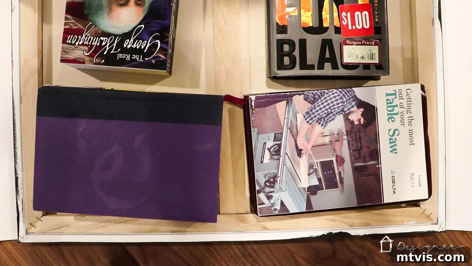 DIY Textured Photo Canvas Art 7 A photo canvas drying upside down with books placed on top to prevent wrinkling.