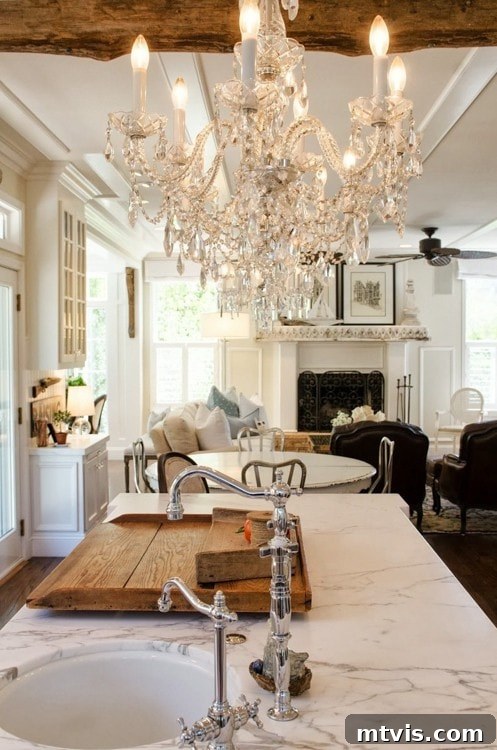 Achieve Stunning Ceilings Faux Wood Beam DIY 5 Glamorous kitchen with a chandelier and stunning faux wood beams on the ceiling.