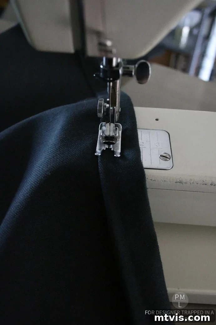 Craft Your Own Hammock Chair 11 Sewing the top seam of the DIY hammock chair fabric on a sewing machine for a clean finish.