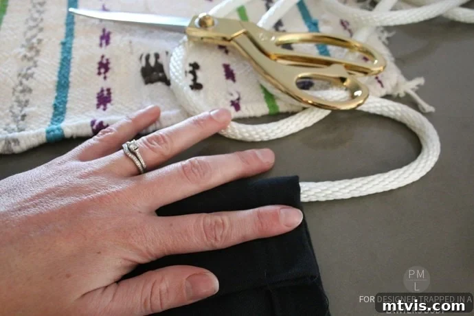 Craft Your Own Hammock Chair 12 Sewing a sturdy side seam to create a rope channel for the DIY hammock chair, showing the folded fabric.