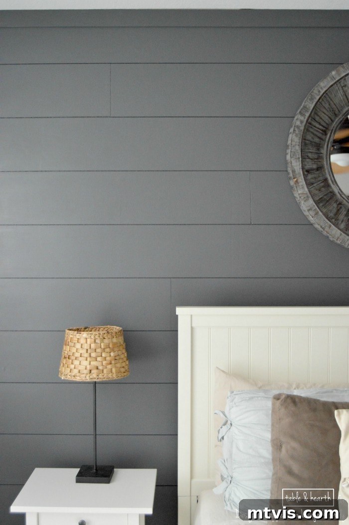 Build a Beautiful Wood Plank Accent Wall 14 SO PRETTY! Add a focal point and interest to your room in just a weekend with this EASY tutorial for installing your own DIY plank wall by Table & Hearth for Designer Trapped in a Lawyer's Body!
