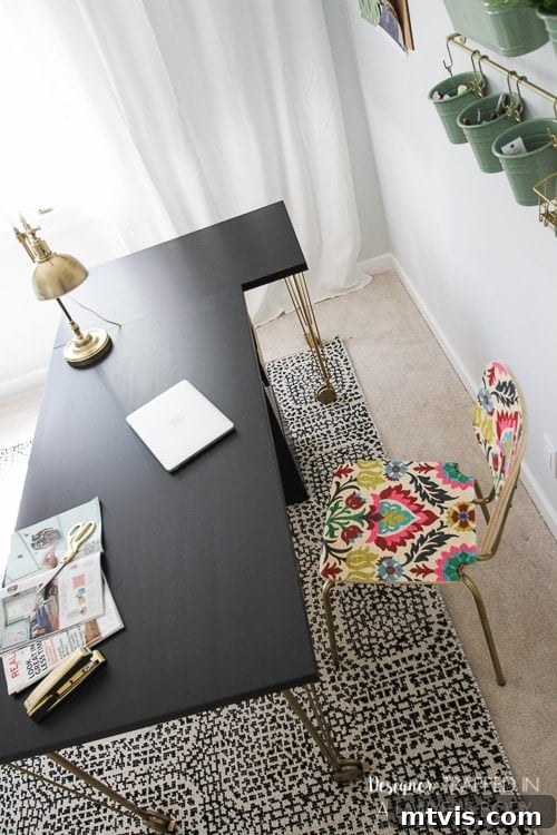 Effortless Ikea Desk Makeover 7 Stylish and functional IKEA hack desk with gold accents, perfectly set up for a productive home office.