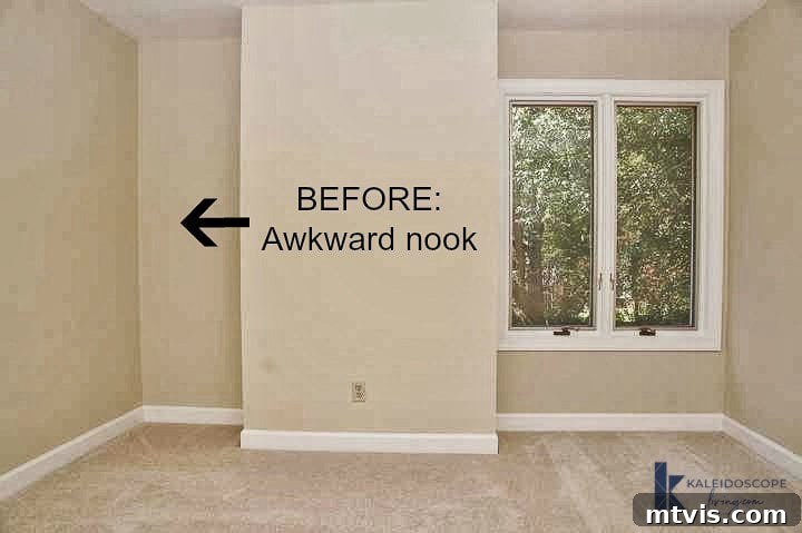 Awkward nook in a girl's bedroom, created by a fireplace chimney, before the installation of DIY floating shelves and a desk. The space appears empty and unutilized.