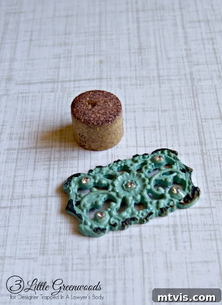 Innovative knob creation: A metal plaque and cork combine for a unique, lightweight handle.