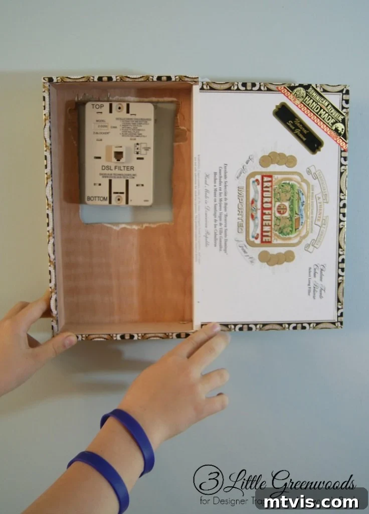 Ready for decorating: Your prepared cigar box is now perfectly sized to hide the phone jack.