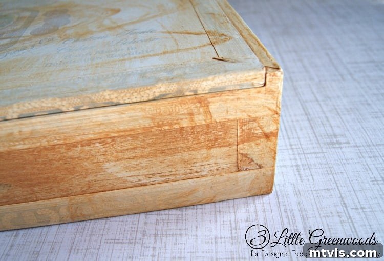 Crafting a weathered look: Applying white and brown paint for an antique, rustic finish.