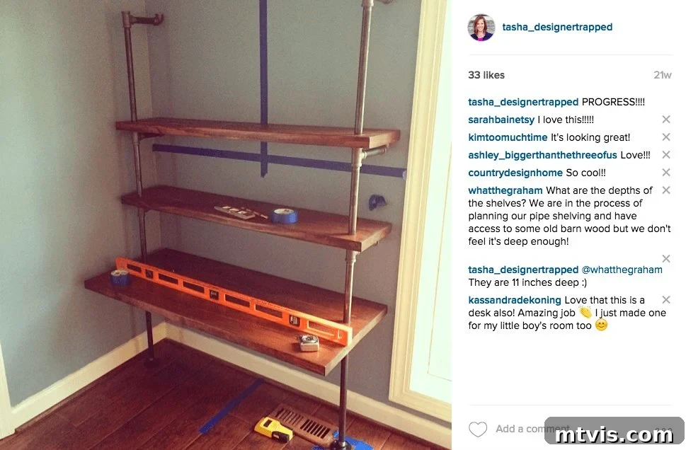 Industrial Chic: DIY Pipe Shelves and Integrated Workspaces 11 Overview of the pipe shelf assembly in progress, showing multiple shelves connected by pipes, demonstrating the upward building method.