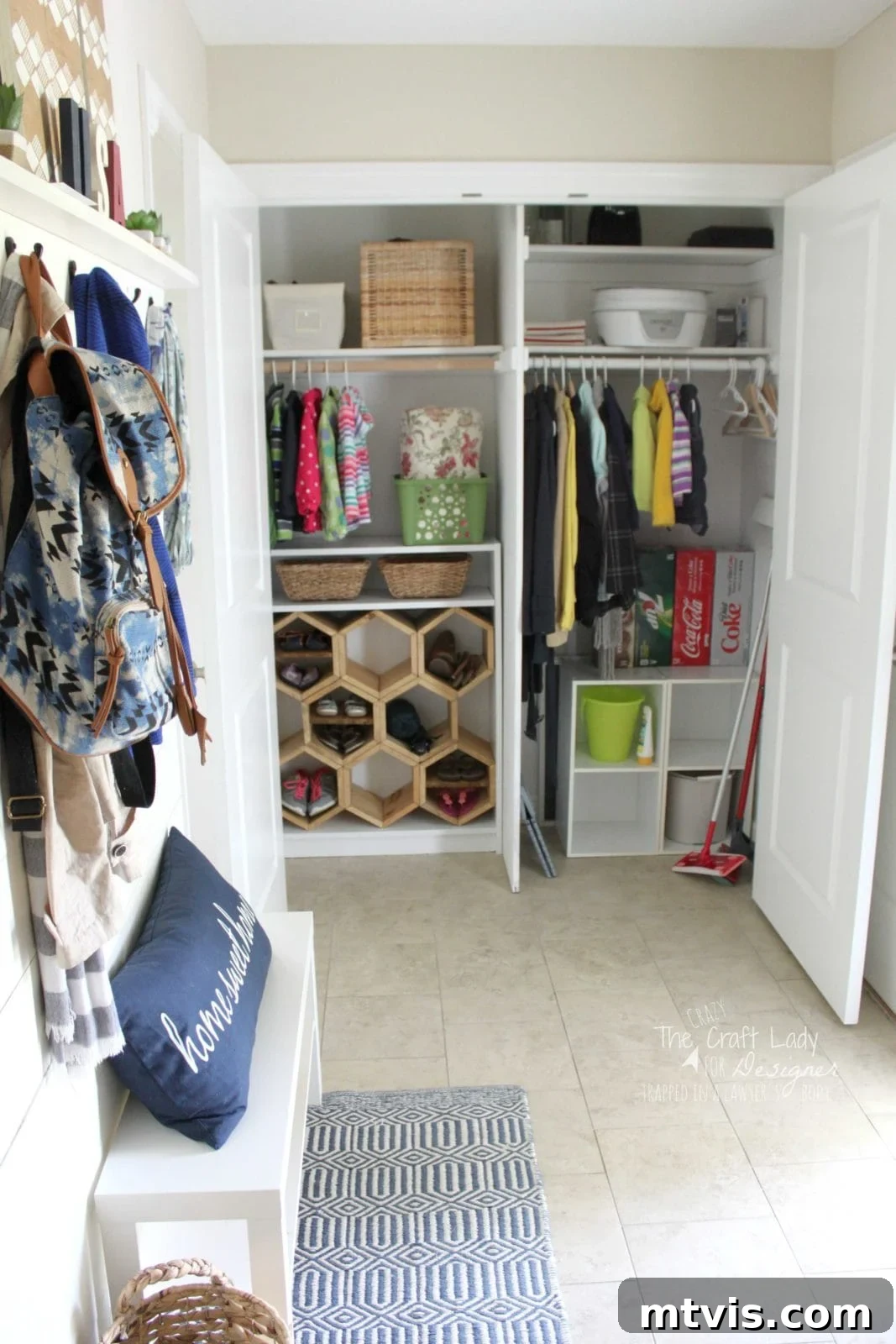 Honeycomb Shoe Organizer 18 An organized mudroom and entryway closet open to show hanging clothes, woven baskets, a DIY shoe rack made of hexagon wood compartments, storage bins, and a bench with pillows and backpacks.