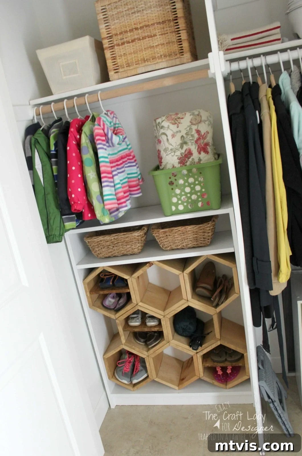 Honeycomb Shoe Organizer 19 A slanted picture of an open, organized entry way closet holding hanging clothes, wicker basket storage, and a bookcase turned into a DIY shoe rack with hexagonal wooden shoe cubbies. The lower right corner has text that reads,