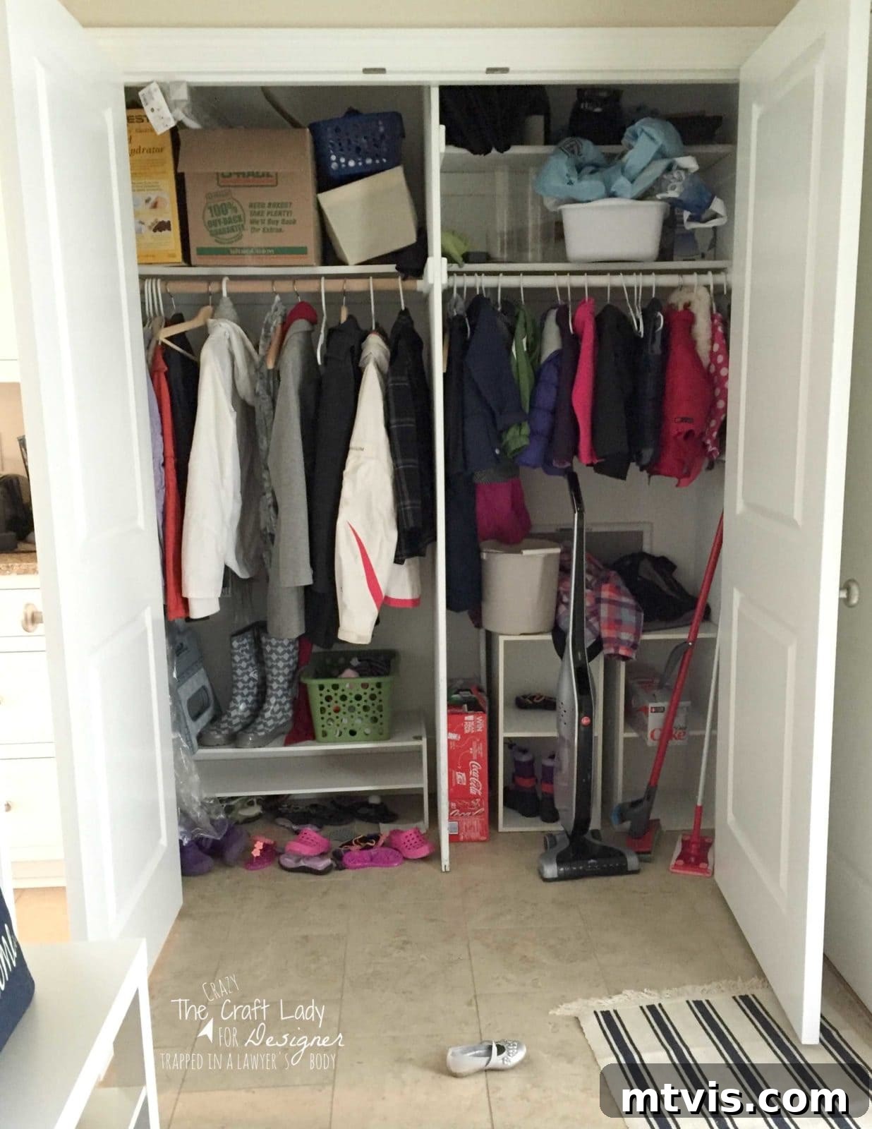 Honeycomb Shoe Organizer 4 A white front hall closet with both double doors open, showing fairly organized family storage, including hanging jackets, helves for shoes and boots, cleaning supplies and more. The lower left corner reads,