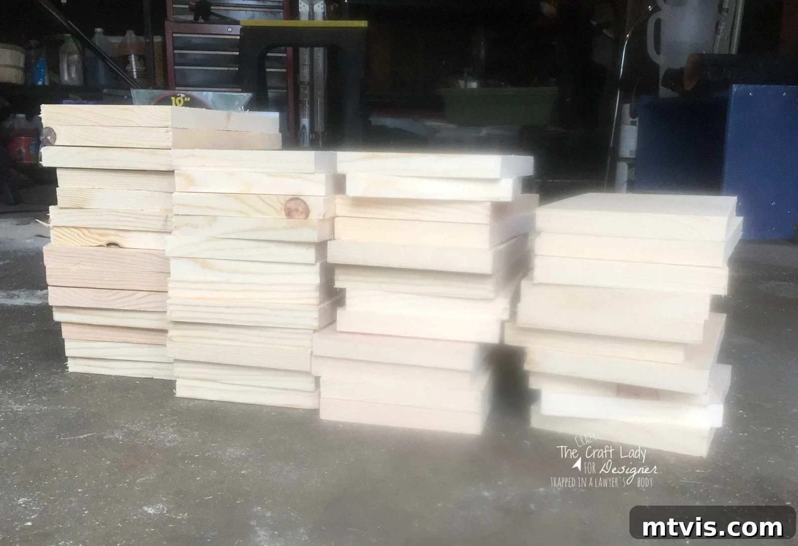 Honeycomb Shoe Organizer 7 A picture of four stacks of square wood pieces on a garage floor, ready to be made into hexagonal pieces for a DIY shoe rack.
