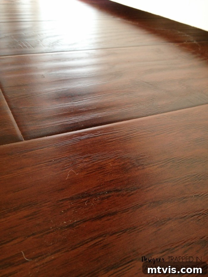 How Laminate Flooring Transformed Our Living Space 6 Beautifully installed laminate flooring in a child's playroom, highlighting the rich texture and visual appeal.