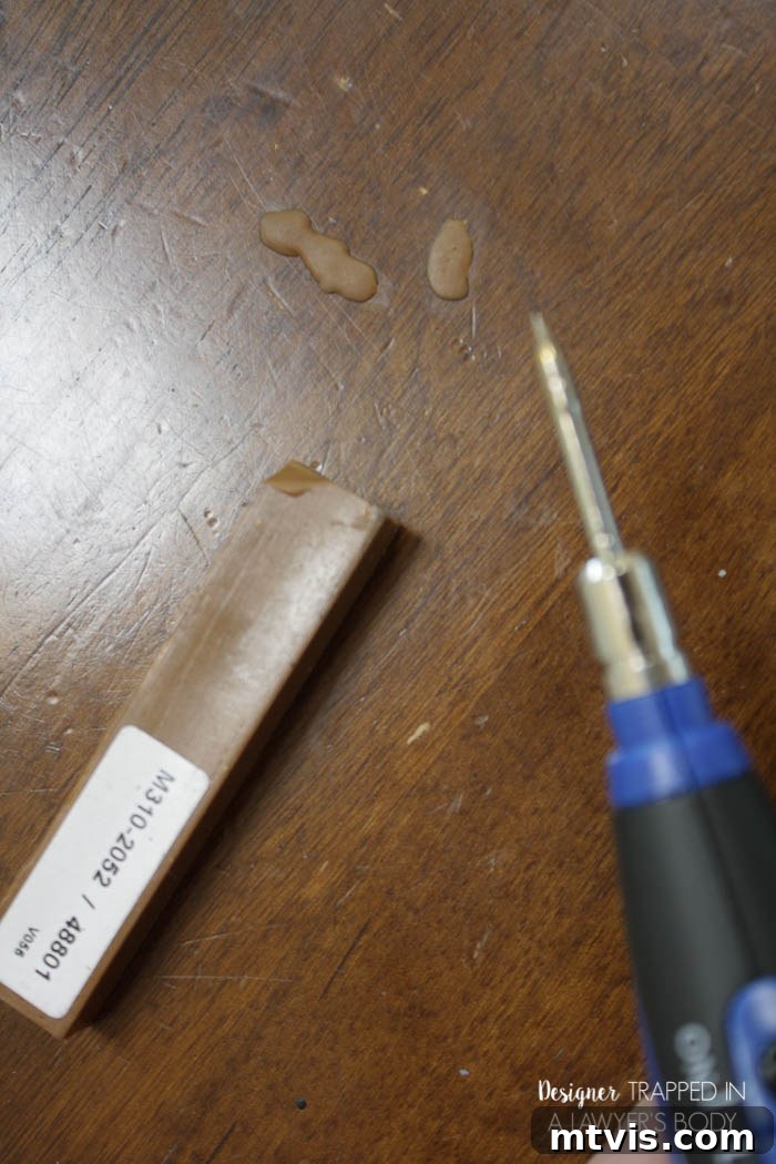 Easy Table Makeover: No Sanding, No Stripping 11 Using Mohawk Quick Fill Burn-In Stick to repair deep gouges