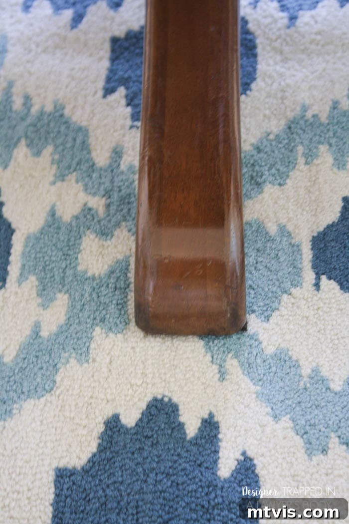 Easy Table Makeover: No Sanding, No Stripping 18 Close-up of a beautifully refinished table leg, showing restored wood grain