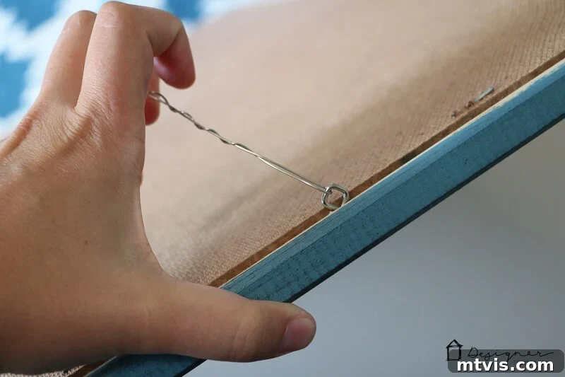 Craft Stunning Frames No Workshop Needed 8 Attaching eye hooks and hanging wire to DIY frame