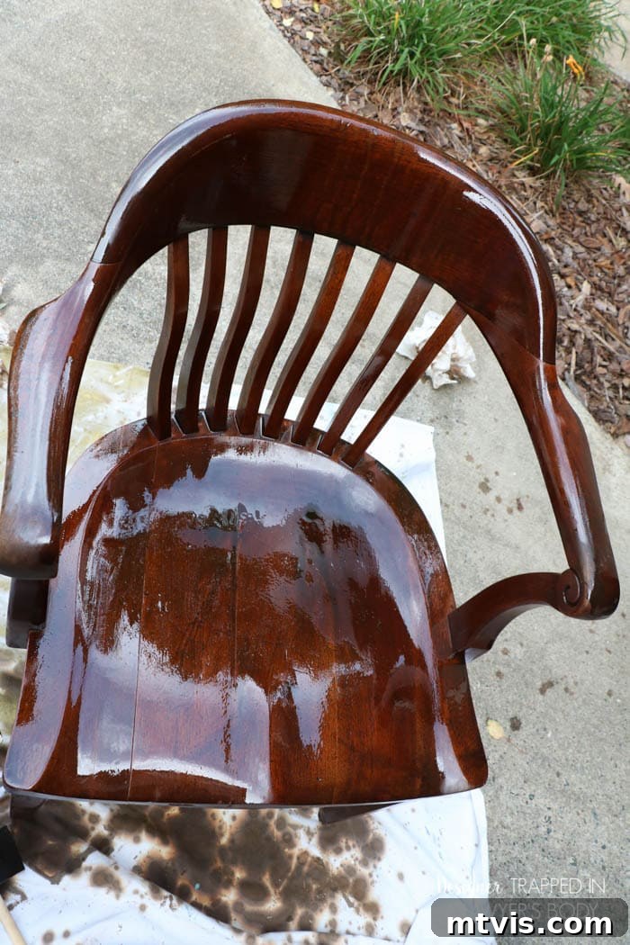 Effortless Wood Chair Refinishing 12 A section of the wood chair after two coats of Mohawk Wiping Wood Stain, showing improved color and depth.