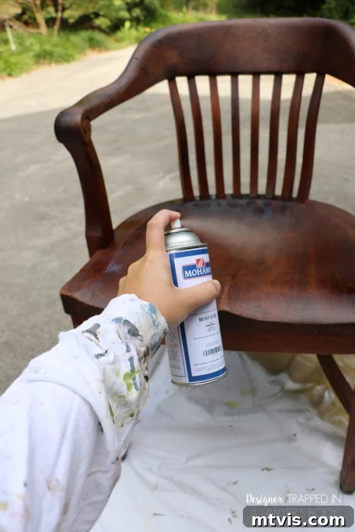 Effortless Wood Chair Refinishing 7 Cleaning an antique wood chair with Mohawk Wax Wash Remover to prepare for refinishing without sanding.