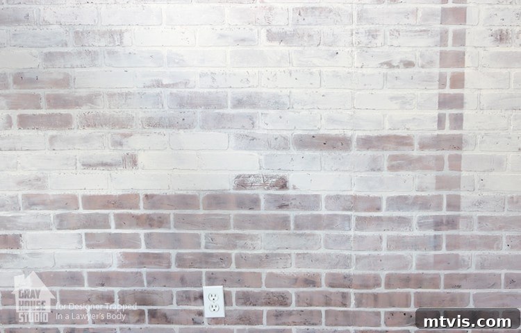 First Layer of Whitewash on Faux Brick for Aged Look